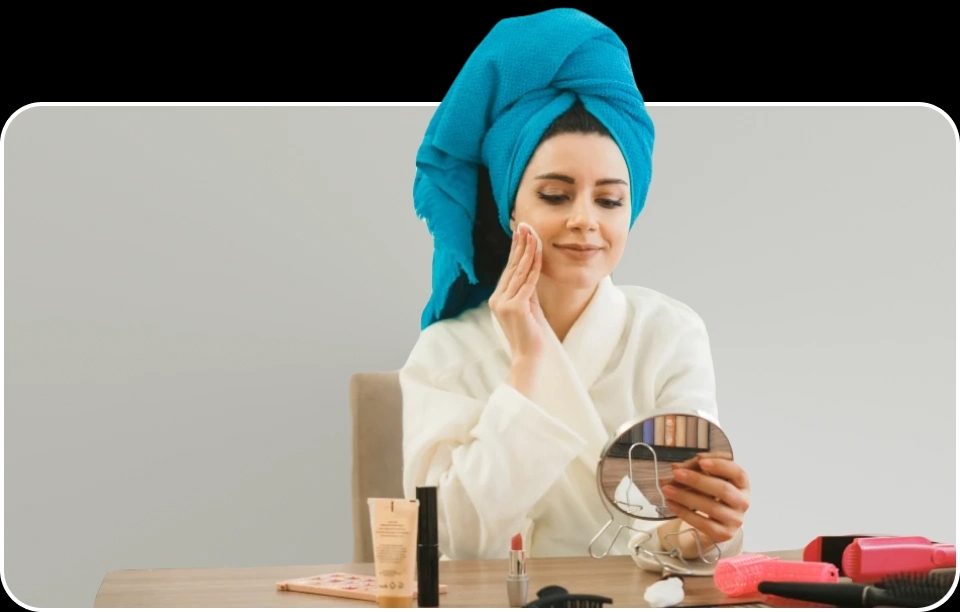 a woman doing makeup